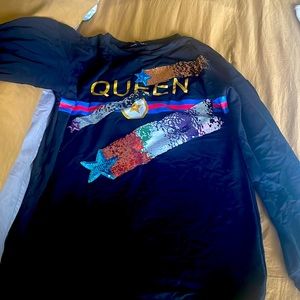 Oversized Queen sweatshirt. Can wear it as a dress